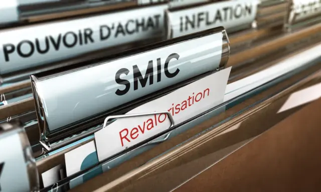 Dossiers de classement : SMIC, pouvoir d'achat, inflation. Un document "Revalorisation" est visible, évoquant une possible augmentation smic 2026.