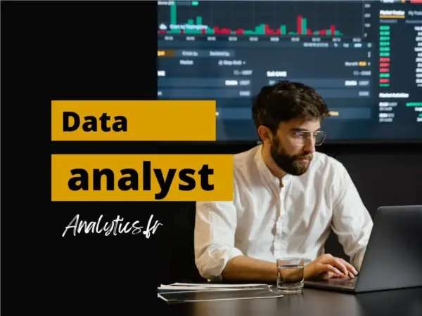 Un homme concentré sur son ordinateur portable, prêt à devenir data analyst. Graphiques financiers en arrière-plan.